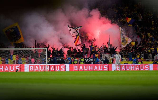 260925 Romanian fans with flares during the Nations League soccer match between Sweden and Romania on September 25, 2026 in Stockholm. Photo by Joel Marklund, BILDBYRAN. Code: JM JM0854 bbeng soccer football fotball Nations League UEFA Nations League Sweden Sweden A Romania Romania audience pyro pyrotechnics  Copyright: JOELxMARKLUND BB260925JM034