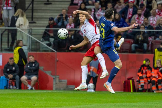 Poland - Bosnia and Herzegovina 25.09.2026 football, Warsaw, PGE National Stadium, UEFA Nations League B Group B4 (pilka nozna, Warszawa, Liga Narodow ) game , match Poland - Bosnia and Herzegovina image shows: Przemyslaw Frankowski (L) Ivan Basic (R) photo Katarzyna Plewczynska Fotostyk Copyright: xKatarzynaxPlewczynskax KAPL2498
