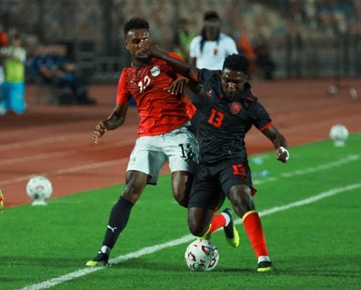 Egypt held to goalless draw by Angola in AFCON qualifier CAIRO, EGYPT, SEPTEMBER 25, 2026: Players from Egypt and Angola compete during their 2027 Africa Cup of Nations qualifying match at Cairo International Stadium in Cairo. Egypt and Angola opened their Group B qualifying campaigns with a 0-0 draw, earning one point each. Cairo Egypt Copyright: x xAbdullahxHamadax xJNAxPressx