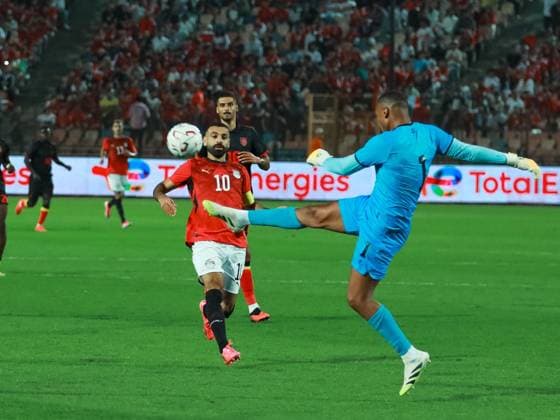 Egypt held to goalless draw by Angola in AFCON qualifier CAIRO, EGYPT, SEPTEMBER 25, 2026: Players from Egypt and Angola compete during their 2027 Africa Cup of Nations qualifying match at Cairo International Stadium in Cairo. Egypt and Angola opened their Group B qualifying campaigns with a 0-0 draw, earning one point each. Cairo Egypt Copyright: x xAbdullahxHamadax xJNAxPressx
