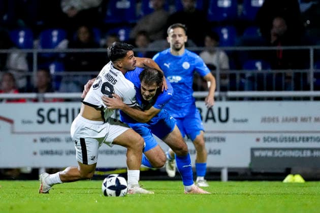 From left: Tasos Leonidis (SVS), 29; Bennet Schieber (FC Astoria), 12; tackle, game scene, duel, tackle, tackling, dynamism, action, September 25, 2026, Walldorf, Germany, soccer, Regionalliga Südwest, FC Astoria Walldorf vs. SV Sandhausen xozx