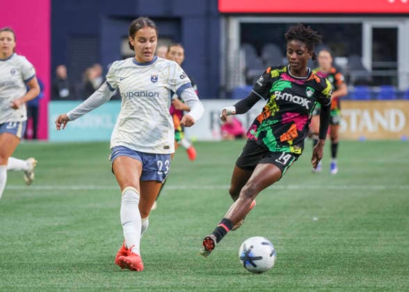 SEATTLE, WA - SEPTEMBER 25: (left to right) Seattle Reign FC defender Jordyn Bugg (23) and Boston Legacy FC forward AÃ¯ssata TraorÃ (14) chase the ball in the first half during the NWSL match between Seattle Reign FC and Boston Legacy FC on September 25, 2026 at Lumen Field in Seattle, Washington. (Photo by Leslie Plaza Johnson Icon Sportswire) SOCCER: SEP 25 NWSL Seattle Reign FC vs Boston Legacy EDITORIAL USE ONLY Icon260925021