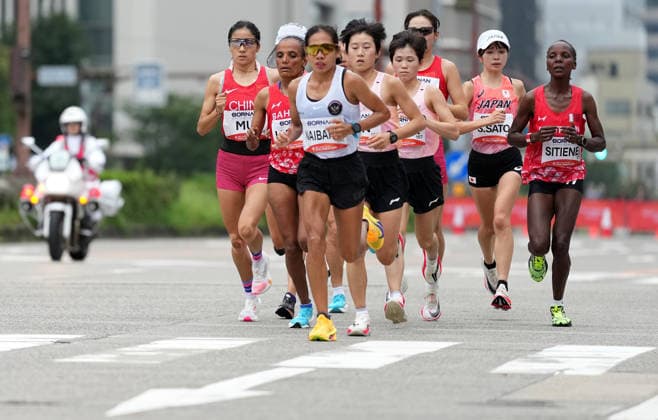 (260926) -- NAGOYA, Sept. 26, 2026 -- Athletes compete during the women s marathon final of Athletics at the 20th Asian Games Aichi-Nagoya 2026 in Nagoya, Japan, Sept. 26, 2026. ) (SP)JAPAN-NAGOYA-ASIAN GAMES-ATHLETICS-WOMEN S MARATHON JiaxYuchen 