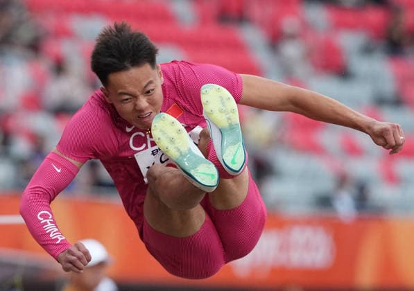 (260926) -- NAGOYA, Sept. 26, 2026 -- Chen Xinghua of China competes during the men s decathlon long jump of athletics at the 20th Asian Games Aichi-Nagoya 2026 in Nagoya, Japan, Sept. 26, 2026. ) (SP)JAPAN-NAGOYA-ASIAN GAMES-ATHLETICS-MEN S DECATHLON-LONG JUMP LuoxYuan 