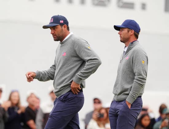 MEDINAH, IL - SEPTEMBER 25: Team USA golfers Scottie Scheffler and Sam Burns walk off the 18th green after losing their match during the second round of the 2026 Presidents Cup on September 25, 2026, at Medinah Country Club in Medinah, Illinois. (Photo by Brian Spurlock Icon Sportswire) GOLF: SEP 25 Presidents Cup EDITORIAL USE ONLY Icon260925135