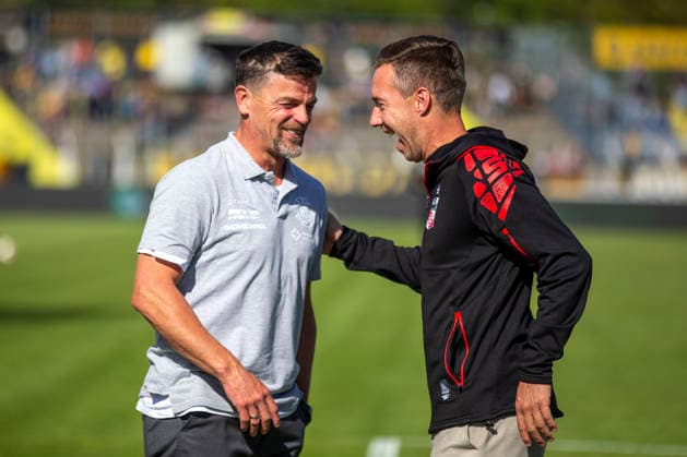 GER, Leipzig, Soccer, Northeast Regional League, Matchday 11, 1 FC Lokomotive Leipzig vs. FC Rot Weiß Erfurt; pictured from left: Torsten Ziegner, head coach of Lokomotive Leipzig, Fabian Gerber, head coach of FC Rot-Weiß Erfurt; emotion; laughing; before the game; the two have been friends for many years; September 26, 2026; Bruno Plache Stadium, Leipzig. DFB regulations prohibit any use of photographs as image sequences and or quasi-video, Copyright: HMBxMedia PaulxFritz