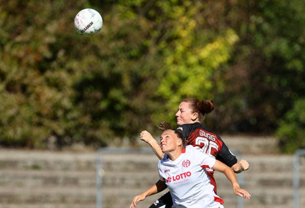 Football Women german DFB Pokal Cup 2026 - 2027 Fc Ingolstadt-FSV Mainz Martin Lara of Mainz ( L ) and Gaugigl Jenny of Ingolstadt fight for the ball during the Women German DFB Pokal Cup 2026 - 2027 football match between Fc Ingolstadt and 1.FSV Mainz 05 at ESV Stadium in Ingolstadt , Bayern , Germany . September 26th , 2026 Photo by Davide Elias Copyright: xDavidexEliasx