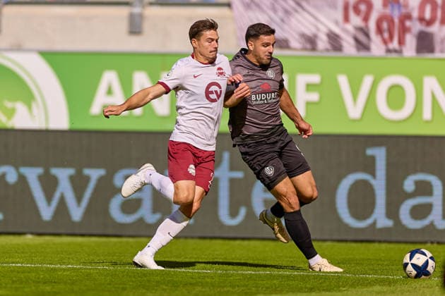 Head-to-head matchup between Nathan Doganay of Kickers Offenbach (No. 22) and Michael Kleinschrodt of VfR Aalen (No. 09), Germany; Kickers Offenbach vs. VfR Aalen, soccer, Men s Regionalliga Southwest, Matchday 9, 2026–2027 season, September 26, 2026 (GER), Kickers Offenbach vs. VfR Aalen, soccer, Regionalliga Southwest Men, Matchday 9, 2026–2027 season, September 26, 2026, Offenbach am Main Copyright: xEibner-Pressefoto GeraldxOelze-dexStoppanyx EP_ODS