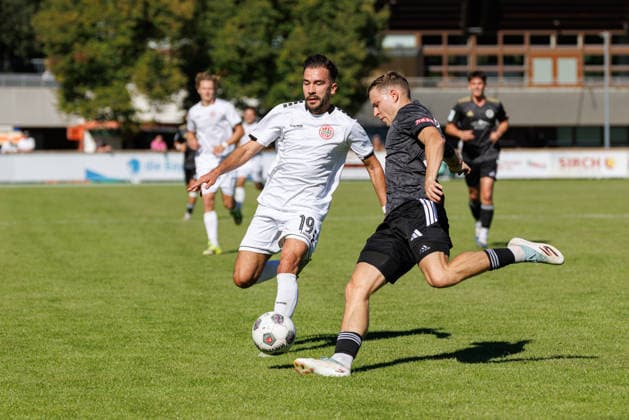 Furkan Kircicek, 19, TSV Landsberg, and Riko Manz, 29, SpVgg Ansbach, during the match between TSV Landsberg and SpVgg Ansbach, soccer, men s, Bavarian Regional League, 2026–2027, Matchday 11 on September 26, 2026, in Landsberg am Lech, Sportpark, Bavaria, Germany