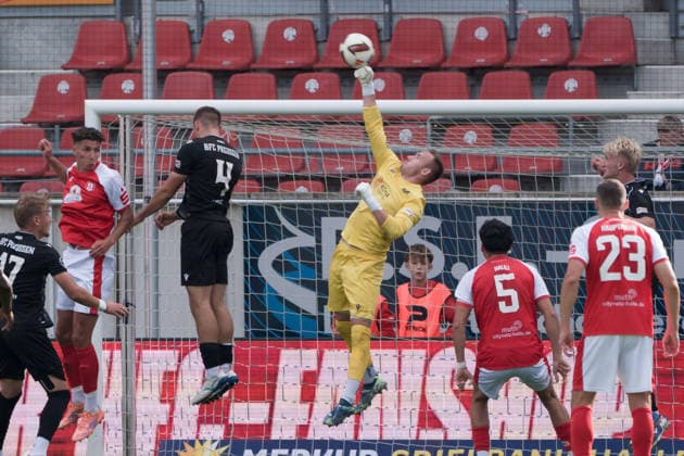 Goalkeeper Florian Palmowski of Preussen, 1, punches the ball away; Hallescher FC vs. BFC Preussen 1894 e.V., soccer, Northeast Regional League, Matchday 11, 2026–27 season, September 26, 2026, Halle Leuna Chemie Stadium, ST Germany