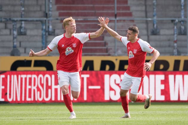 Lennard Becker (HFC), 25, high-fiving Marius Hauptmann (HFC), 23, after his goal to make it 1–2, Hallescher FC vs. BFC Preussen 1894 e.V., soccer, Northeast Regional League, Matchday 11, 2026–27 season, September 26, 2026, Halle Leuna Chemie Stadium, ST Germany