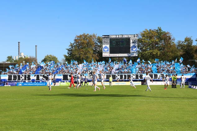Soccer, Men s, Bavarian Regional League, 2026–2027 Season, SV Wacker Burghausen vs. TSV 1860 Munich, flatbuy Stadium on Liebigstraße, TSV 1860 Munich fan display, Ultras, atmosphere, banners, TSV is back