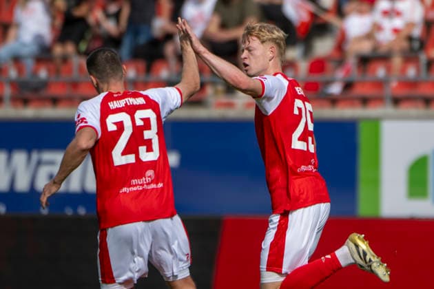 Regionalliga Nordost, Season 26–27: Hallescher FC vs. BFC Preussen Berlin 1894 e.V., Halle, Germany, September 26, 2026. Pictured, from left: Marius Hauptmann (Halle) and Lennard Becker (Halle) celebrate the goal that made the score 1–2. joy, emotion, goal celebration, goal scorers, goal scorer, Halle Saale Leuna Chemie Stadium, Saxony-Anhalt, Germany