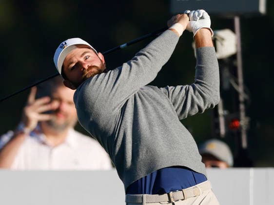 Cameron Young of the United States tees off on the second hole in a four-ball match during the third round of the 2026 President s Cup golf tournament at Medinah Country Club in Chicago, Illinois, on Saturday, September 26, 2026.  CHI20260926701 TANNENxMAURY