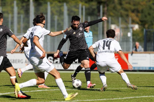 Dino Nuhanovic 7, SpVgg Ansbach, and Maximilian Holdenrieder 14, TSV Landsberg, during the match between TSV Landsberg and SpVgg Ansbach, soccer, men’s, Bavarian Regional League, 2026–2027, Matchday 11 on September 26, 2026, in Landsberg am Lech, Sportpark, Bavaria, Germany