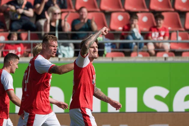 Niclas Stierlin (HFC), No. 13, with a clenched fist after scoring the goal to make it 3–2, Hallescher FC vs. BFC Preussen 1894 e.V., Soccer, Northeast Regional League, Matchday 11, 2026–27 Season, September 26, 2026, Halle Leuna Chemie Stadium, ST, Germany
