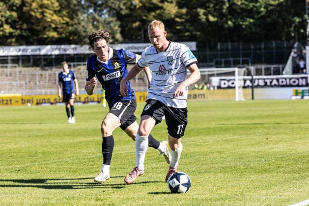 SSV Ulm 1846 Soccer vs. SV Eintracht Trier, Soccer, Regionalliga Southwest, Matchday 9, Donaustadion Ulm, September 26, 2026, photo by Noah Herber, SV Eintracht Trier, 38, Leon Müller, SSV Ulm 1846 Soccer, 17, SSV Ulm 1846 Soccer vs. SV Eintracht Trier, Soccer, Regionalliga Southwest, Matchday 9, Donaustadion Ulm, September 26, 2026; Photo by Lucca Fundel; Ulm Donaustadion, Baden-Württemberg, Germany