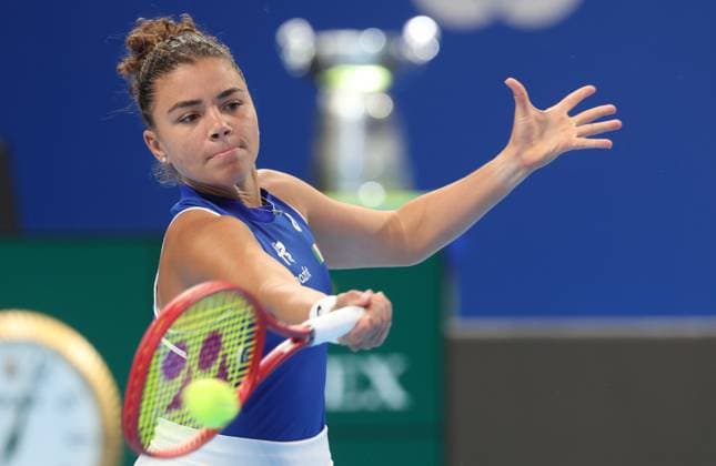 Jasmine Paolini pictured in action during the tennis match between Svitolina and Paolini, in the the tie between Ukraine and Italy in the Semi Finals of the Billie King Cup tournament, on Saturday 26 September 2026 in Shenzhen, China. VIRGINIExLEFOUR  x187881287x