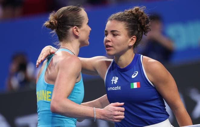 Elina Svitolina and Jasmine Paolini embrace after their tennis match, in the the tie between Ukraine and Italy in the Semi Finals of the Billie King Cup tournament, on Saturday 26 September 2026 in Shenzhen, China. VIRGINIExLEFOUR  x187881341x