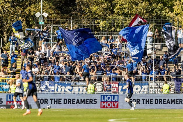 SV Eintracht Trier fans in the visitors section; SSV Ulm 1846 soccer fans vs. SV Eintracht Trier, soccer, Regionalliga Südwest, Matchday 9, Donaustadion Ulm, September 26, 2026, Ulm Copyright: xLuccaxFundelx EP_EER