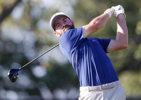 Cameron Young of the United States tees off on the fourth hole in a four-ball match during the third round of the 2026 President s Cup golf tournament at Medinah Country Club in Chicago, Illinois, on Saturday, September 26, 2026.  CHI20260926710 TANNENxMAURY