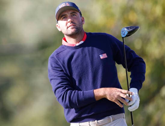 Scottie Scheffler of the United States watches his drive after teeing off on the fourth hole in a four-ball match during the third round of the 2026 President s Cup golf tournament at Medinah Country Club in Chicago, Illinois, on Saturday, September 26, 2026.  CHI20260926716 TANNENxMAURY