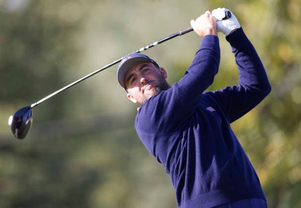 Scottie Scheffler of the United States tees off on the fourth hole in a four-ball match during the third round of the 2026 President s Cup golf tournament at Medinah Country Club in Chicago, Illinois, on Saturday, September 26, 2026.  CHI20260926717 TANNENxMAURY