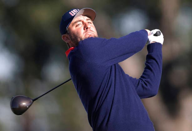 Scottie Scheffler of the United States tees off on the fifth hole in a four-ball match during the third round of the 2026 President s Cup golf tournament at Medinah Country Club in Chicago, Illinois, on Saturday, September 26, 2026.  CHI20260926725 TANNENxMAURY