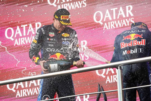 F1 - AZERBAIJAIN GRAND PRIX 2026 VERSTAPPEN Max (nld), Red Bull Racing Ford RB22, portrait HADJAR Isack (fra), Red Bull Racing Ford RB22, portrait podium Moet during the 2026 Formula 1 Azerbaijan Grand Prix, 15th round of the 2026 Formula One World Championship, WM, Weltmeisterschaft from September 24 to 26, 2026 on the Baku City Circuit, in Baku, Azerbaijan - BakuAzerbaijan Copyright: xXavixBonillax