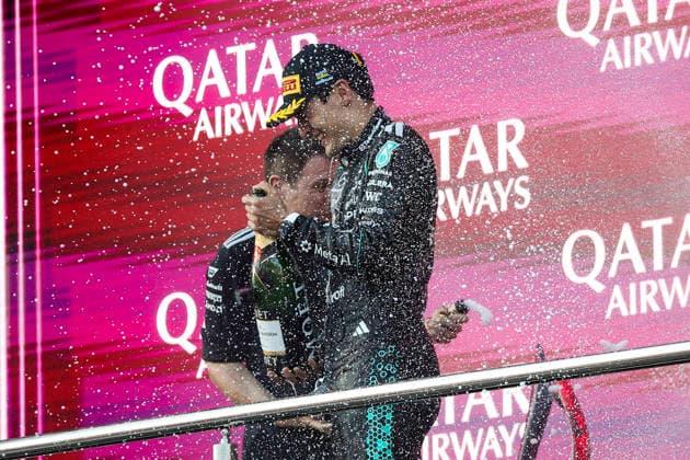 F1 - AZERBAIJAIN GRAND PRIX 2026 RUSSELL George (gbr), Mercedes AMG F1 Team W17, portrait podium Moet during the 2026 Formula 1 Azerbaijan Grand Prix, 15th round of the 2026 Formula One World Championship, WM, Weltmeisterschaft from September 24 to 26, 2026 on the Baku City Circuit, in Baku, Azerbaijan - BakuAzerbaijan  Copyright: xXavixBonillax