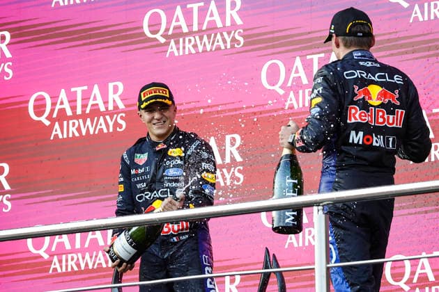 F1 - AZERBAIJAIN GRAND PRIX 2026 HADJAR Isack (fra), Red Bull Racing Ford RB22, portrait VERSTAPPEN Max (nld), Red Bull Racing Ford RB22, portrait podium Moet during the 2026 Formula 1 Azerbaijan Grand Prix, 15th round of the 2026 Formula One World Championship, WM, Weltmeisterschaft from September 24 to 26, 2026 on the Baku City Circuit, in Baku, Azerbaijan - BakuAzerbaijan Copyright: xXavixBonillax