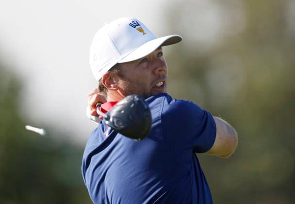Sam Burns of the United States tees off on the sixth hole in a four-ball match during the third round of the 2026 President s Cup golf tournament at Medinah Country Club in Chicago, Illinois, on Saturday, September 26, 2026.  CHI20260926733 TANNENxMAURY