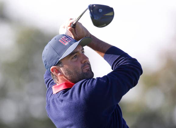 Scottie Scheffler of the United States tees off on the sixth hole in a four-ball match during the third round of the 2026 President s Cup golf tournament at Medinah Country Club in Chicago, Illinois, on Saturday, September 26, 2026.  CHI20260926734 TANNENxMAURY