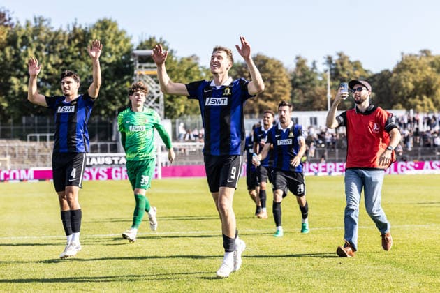 SSV Ulm 1846 Soccer vs. SV Eintracht Trier, Soccer, Regionalliga Southwest, Matchday 9, Donaustadion Ulm, September 26, 2026—Jubilation, joy, and excitement after the away win (from left): Dimitrios Mitakidis (SV Eintracht Trier), 4, Matthias Fettes (SV Eintracht Trier), 39, Dejan Galjen (SV Eintracht Trier), 9. SSV Ulm 1846 Soccer vs. SV Eintracht Trier, Soccer, Southwest Regional League, Matchday 9, Donaustadion Ulm, September 26, 2026. Photo by Lucca Fundel. Ulm Donaustadion, Baden-Württemberg, Germany