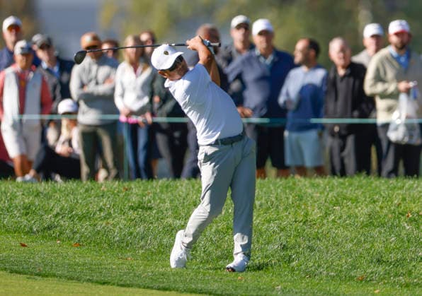 International team player Ryo Hisatsune of Japan hits from the fairway on the sixth hole in a four-ball match during the third round of the 2026 President s Cup golf tournament at Medinah Country Club in Chicago, Illinois, on Saturday, September 26, 2026.  CHI20260926737 TANNENxMAURY