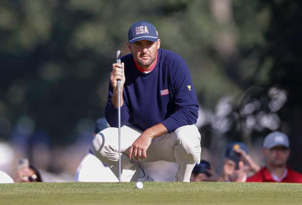 Scottie Scheffler of the United States lines up a putt on the sixth green in a four-ball match during the third round of the 2026 President s Cup golf tournament at Medinah Country Club in Chicago, Illinois, on Saturday, September 26, 2026.  CHI20260926743 TANNENxMAURY