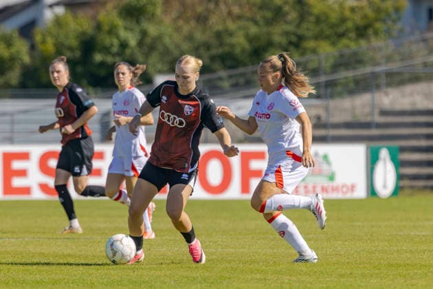 Ingolstadt, Germany, September 26, 2026, 2026-2027 DFB Women’s Cup, First Round: FC Ingolstadt 04 0–1 FSV Mainz 05. Pictured from left, in a tackle: Teresa Fritzberg (FCI) and Lara Martin (FSV). DFL and DFB regulations prohibit any use of photographs as image sequences and or quasi-video. ESV Stadion Bayern Copyright: xFotostandx xSchäferx