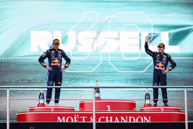 BAKU, AZERBAIJAN - SEPTEMBER 26: Max Verstappen of the Netherlands and Oracle Red Bull Racing and Isack Hadjar of France and Oracle Red Bull Racing on podium after finishing second and third in the F1 Grand Prix of Azerbaijan at Baku City Circuit on September 26, 2026 in Baku, Azerbaijan. (Photo by Qian Jun SPP-Paddocker) Copyright: xQianxJun SPP-Paddockerx Sportspressphoto_SPR240059