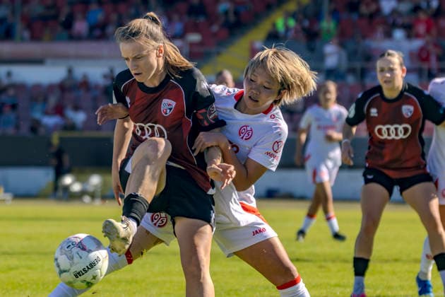 Ingolstadt, Germany, September 26, 2026—2026–2027 DFB Women’s Cup, First Round: FC Ingolstadt 04 vs. FSV Mainz 05. Pictured, from left, in a tackle: Stefanie Reischmann (FCI) and Suguri Hashitani (FSV). DFL and DFB regulations prohibit any use of photographs as image sequences and or quasi-video. ESV Stadion Bayern Copyright: xFotostandx xSchäferx