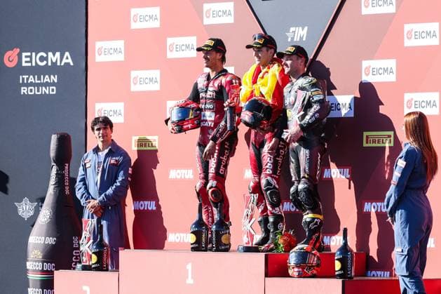 September 26, 2026, San Martino Del Lago, Cremona, Italy: (C) Iker Lecuona of Aruba.it Racing - Ducati with Ducati Panigale V4R first place in Race 1 compose the podium with (L) Nicolo Bulega of Aruba.it Racing - Ducati with Ducati Panigale V4R second place and (R) Sam Lowes of ELF Marc VDS Racing Team with Ducati Panigale V4R third place during Podium Race 1 of SBK Round 10 EICMA Italian Round. SBK Round 10 EICMA Italian Round (Podium Race 1) In San Martino Del Lago, Italy - 26 Sep 2026  - ZUMAs197 20260926_aaa_s197_166 Copyright: xFabrizioxCarabellix
