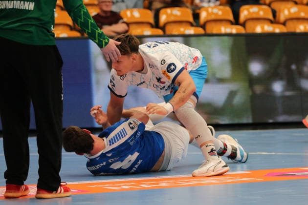 September 26, 2026 Men s Handball 2026–2027 2nd Handball Bundesliga, Matchday 5: Dessau Roßlauer HV 06 1 VfL Potsdam, Anhalt Arena, Dessau; Marcel Nowak (Dessau), 15, in blue, in a duel with Tommaso Romei, Potsdam, 50, in white; Dessau-Roßlau, Saxony-Anhalt, Germany