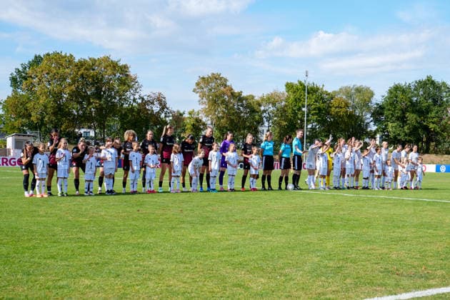 September 25, 2026, Soccer, 1st Round of the 2026–2027 DFB Women s Cup, SG 99 Andernach vs. SC Freiburg SC Freiburg, the referees, and SG 99 Andernach wave to the fans