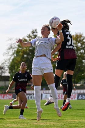 September 25, 2026, Soccer, 1st Round of the 2026–2027 DFB Women’s Cup, SG 99 Andernach vs. SC Freiburg: Carolin Schraa (7) of SG 99 Andernach and Emma Memminger (32) of SC Freiburg in a header duel