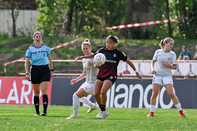 September 25, 2026, Soccer, 1st Round of the 2026–2027 DFB Women s Cup, SG 99 Andernach vs. SC Freiburg, Nicole Ojukwu 6; SC Freiburg holds onto the ball in front of Carolin Schraa of SG 99 Andernach; Referee Annika Kost takes a close look at the play