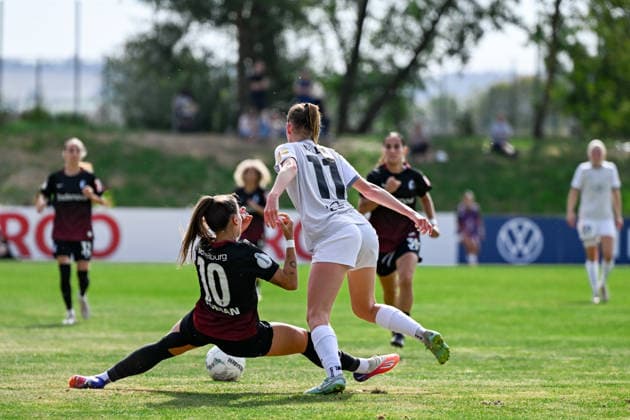 September 25, 2026, Soccer, 1st Round of the 2026–2027 DFB Women s Cup, SG 99 Andernach vs. SC Freiburg: Selina Vobian (10) of SC Freiburg gives it her all to prevent Ina Keller (11) of SG 99 Andernach from winning the ball