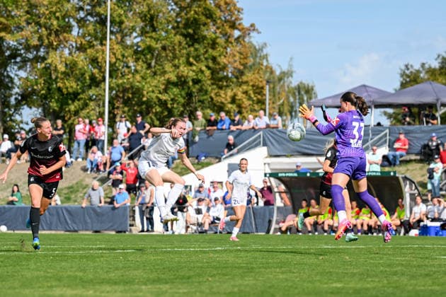 September 25, 2026, Soccer, 1st Round, 2026–2027 DFB Women s Cup, SG 99 Andernach vs. SC Freiburg, Vanessa Zilligen 15, SG 99 Andernach takes a shot right at goalkeeper Lorena Barth 33, SC Freiburg