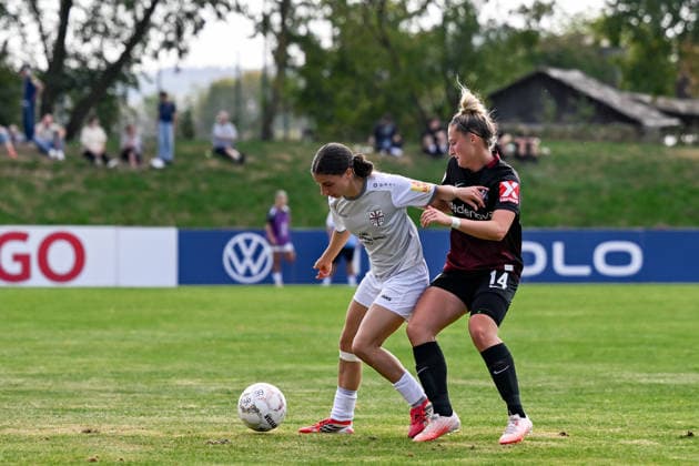 September 25, 2026, Soccer, 1st Round of the 2026–2027 DFB Women s Cup, SG 99 Andernach vs. SC Freiburg, Narjiss Ahamad (6) of SG 99 Andernach tries to win the ball against Carina Brunold (14) of SC Freiburg