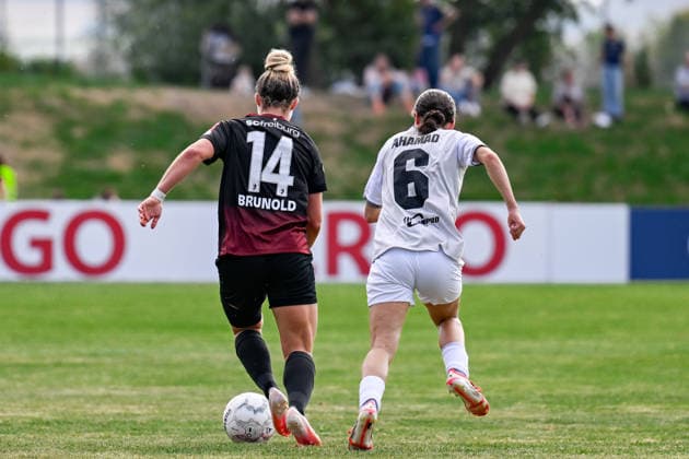 September 25, 2026, Soccer, 1st Round of the 2026–2027 DFB Women s Cup, SG 99 Andernach vs. SC Freiburg Carina Brunold 14 SC Freiburg wins the ball Narjiss Ahamad 6 SG 99 Andernach runs after her