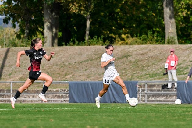 September 25, 2026, Soccer, 1st Round of the 2026–2027 DFB Women s Cup, SG 99 Andernach vs. SC Freiburg, Mia Trombin 14; SG 99 Andernach wins possession and sprints along the sideline