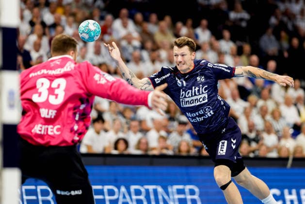 Kiel, September 26, 2026; Handball, 2026–27 Bundesliga 1, THW Kiel vs. SG Flensburg Handewitt; Andreas Wolff (THW Kiel, 33), Emil Jakobsen (SG Flensburg Handewitt, 31)